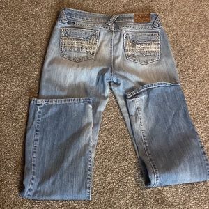 Size 8 perfect pair of work jeans. Has a stain.